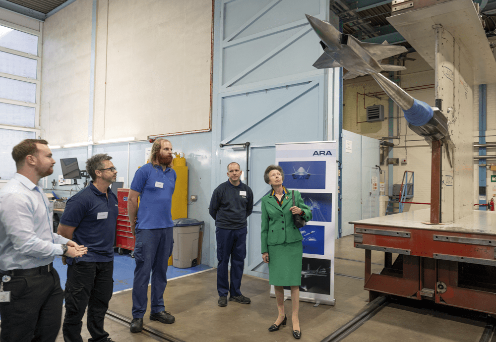 The Princess Royal, Princess Anne with Stephen Smith and Pete Goddard at ARA Ltd, Bedford. 
